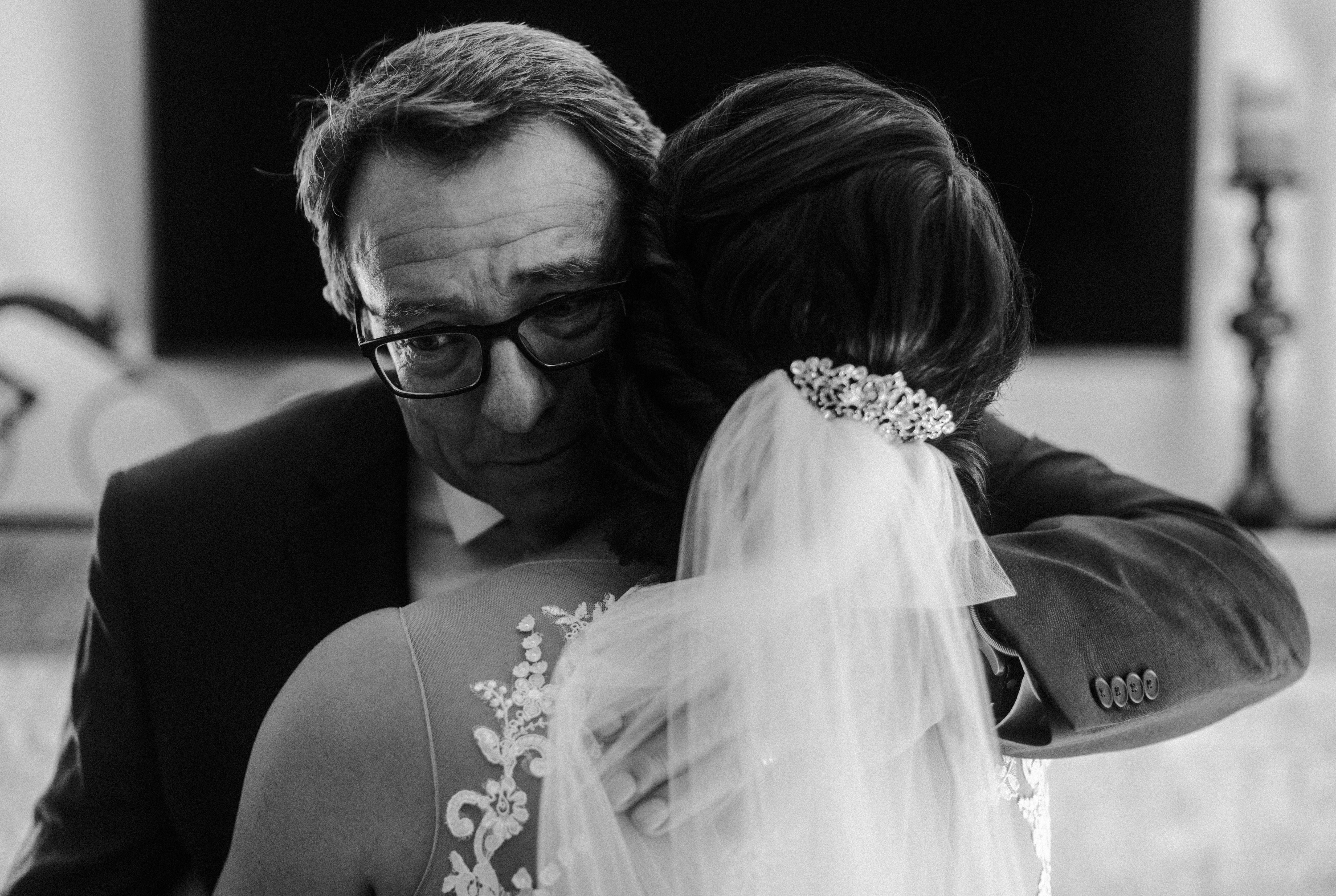 Father of the bride tearing up after seeing his daughter for the first time